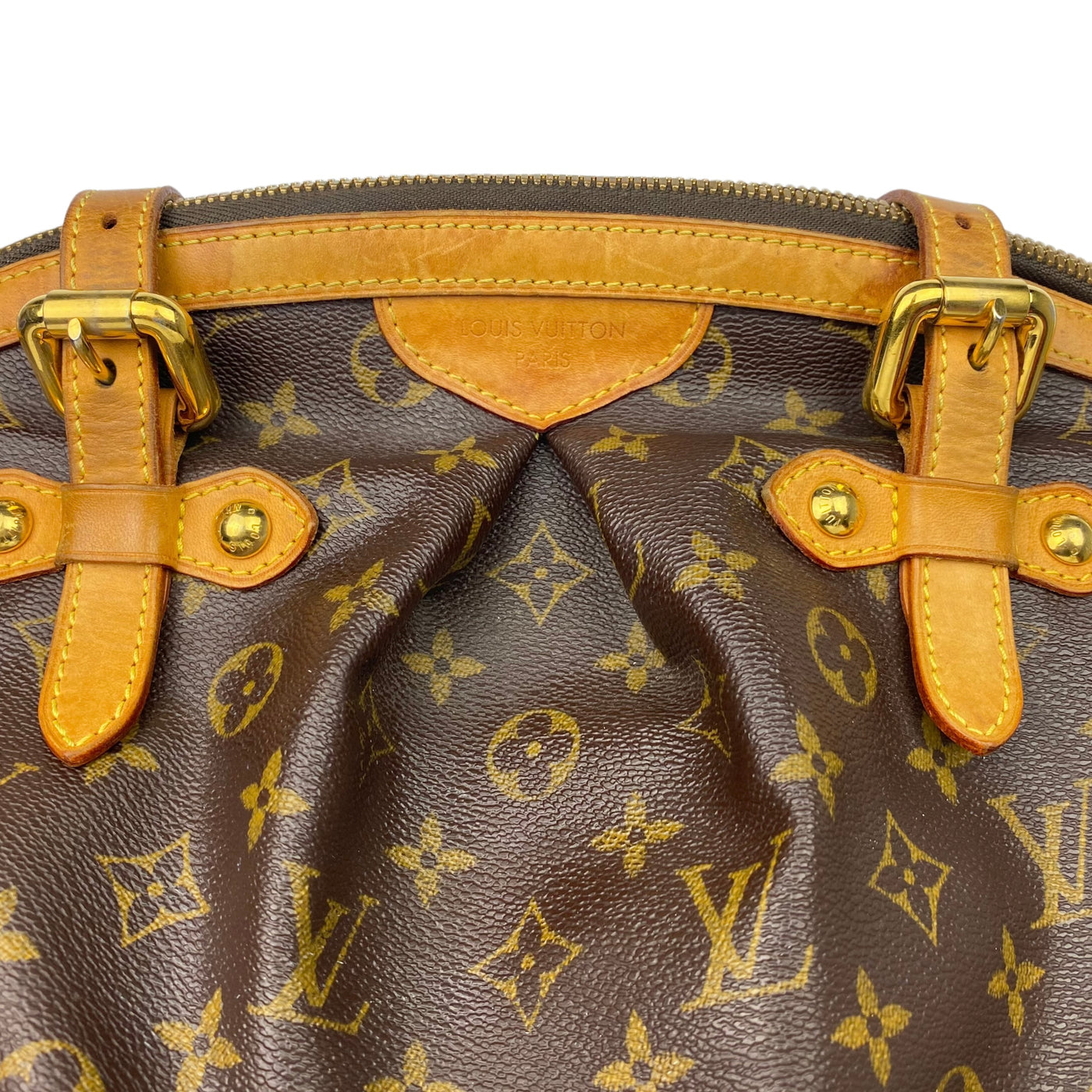 Louis Vuitton Tivoli Handbag logo close up