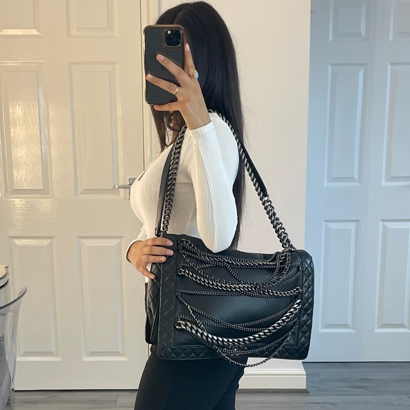 Chanel black Enchained XL Boy Bag Worn modelled