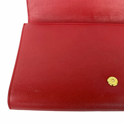 YSL designer red clutch bag inner flap