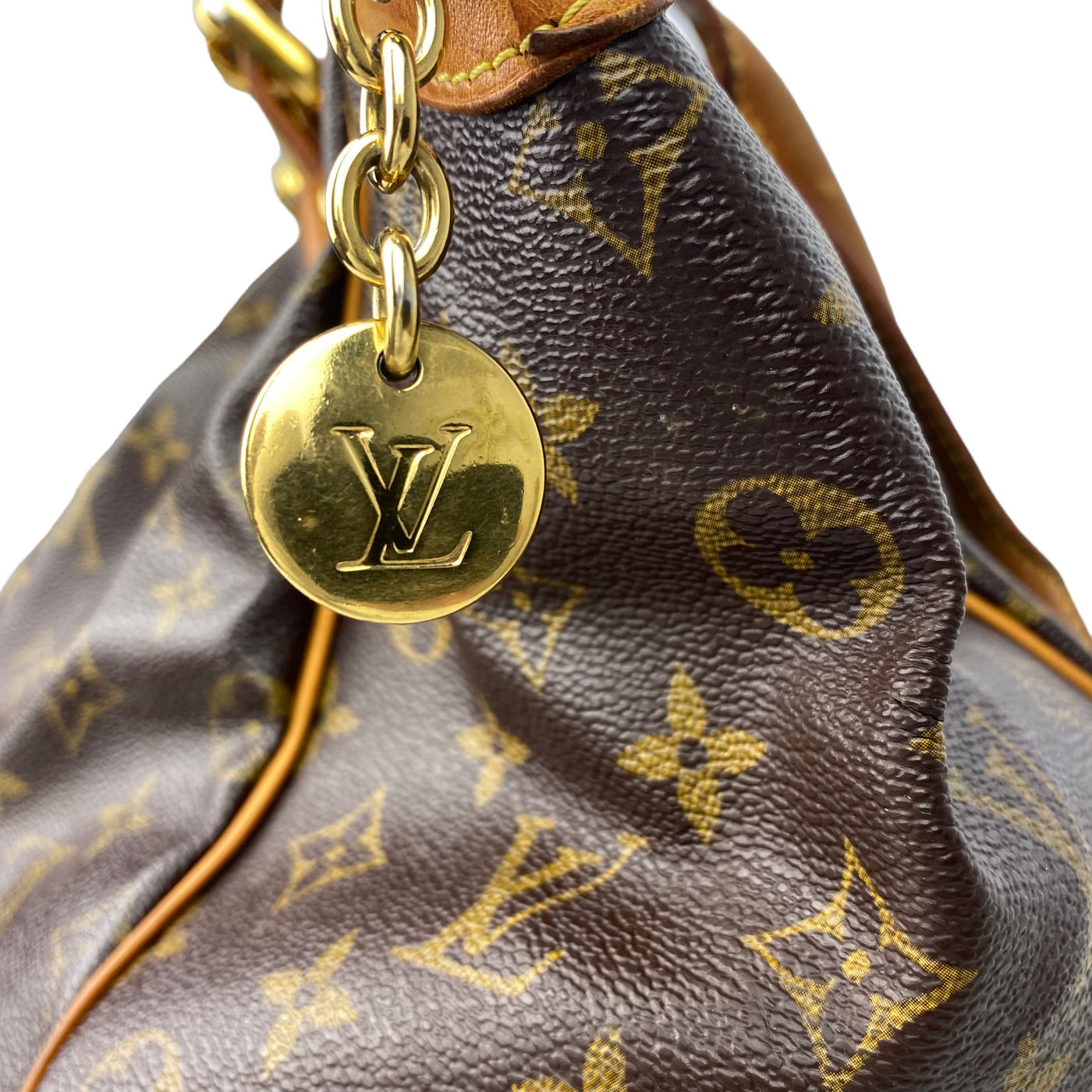 Louis Vuitton Tivoli Handbag charm close up