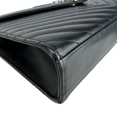 YSL designer black envelope bag corner